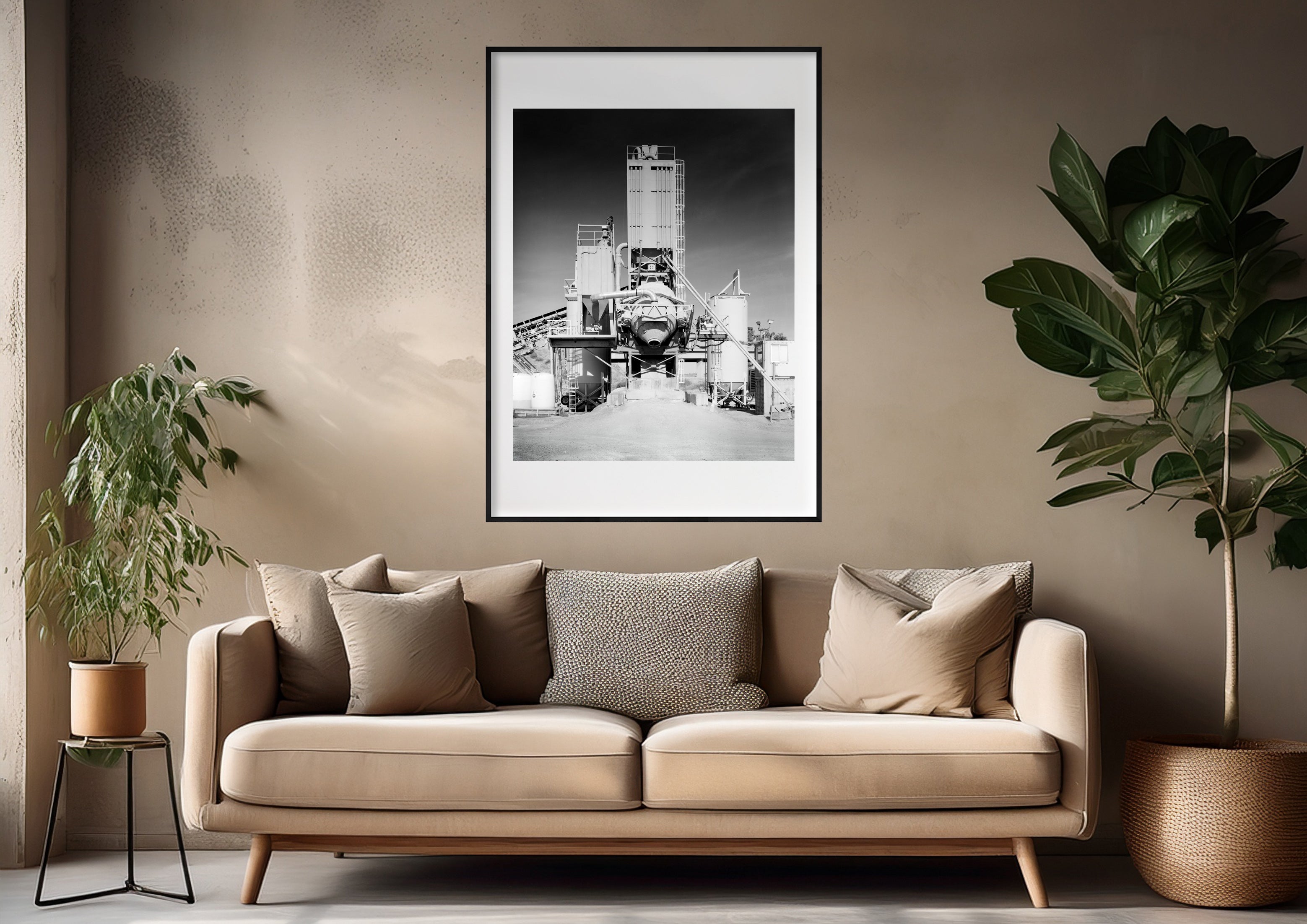 Black and white photograph of an industrial structure displayed in a styled interior setting (mockup)