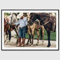Colour photograph of a young horseman standing quietly among saddled horses during a traditional gathering in San Miguel de Allende, shown in a black wooden frame
