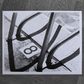 One-off black and white darkroom photograph of a swimming pool ladder and 8 marking, hand-printed by the artist.