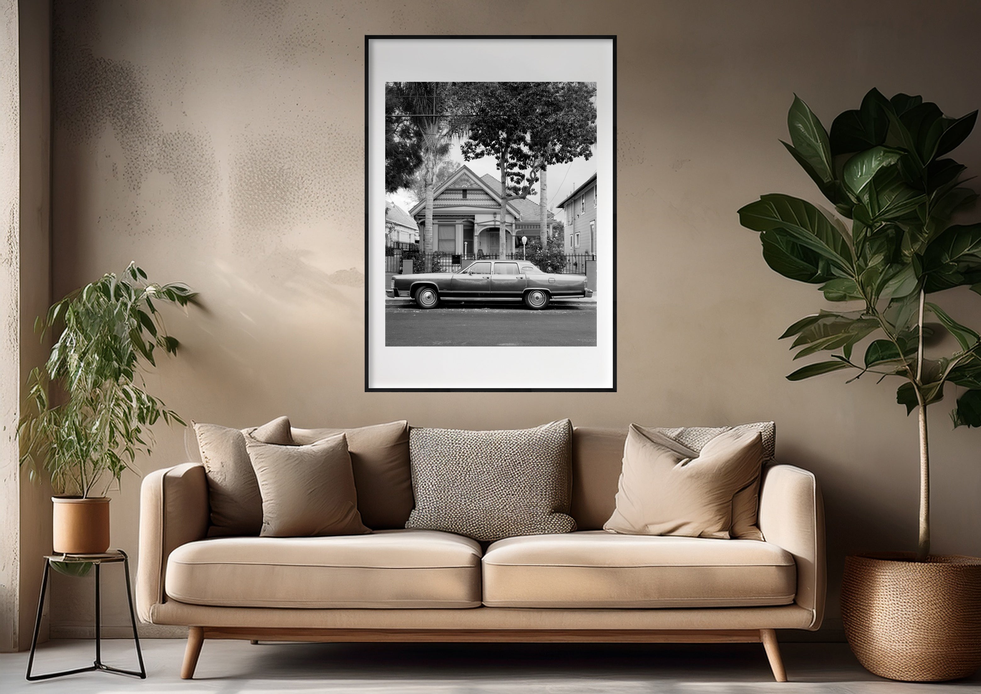 Black and white photograph of a residential street scene displayed in a styled interior setting (mockup)