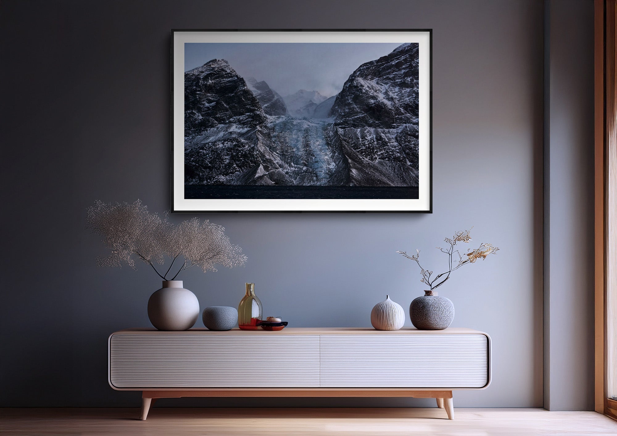 Colour photograph of layered ice formations, displayed in a styled interior setting (mockup)