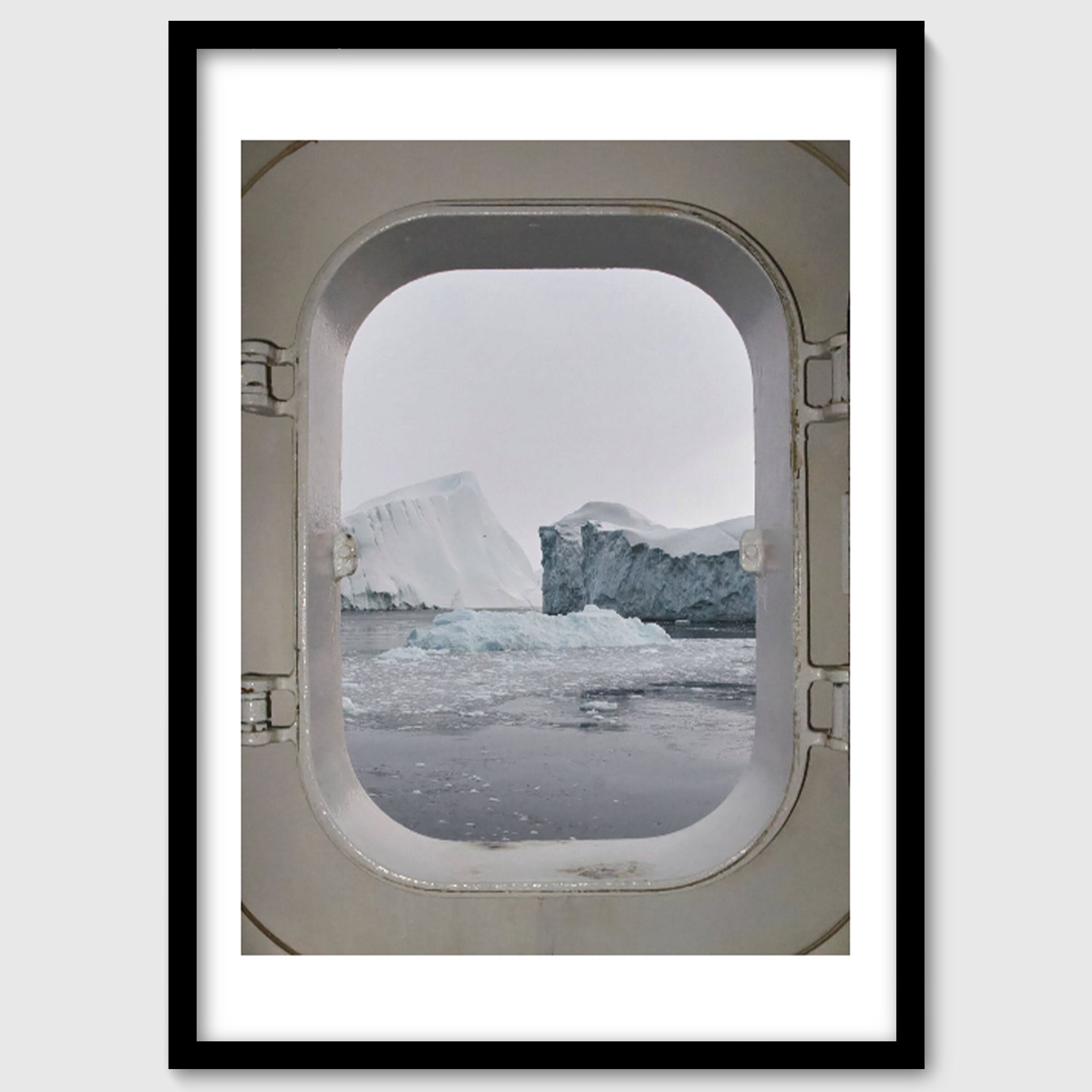 Portal – Icebergs Through a Ship Porthole, Greenland Arctic Photography