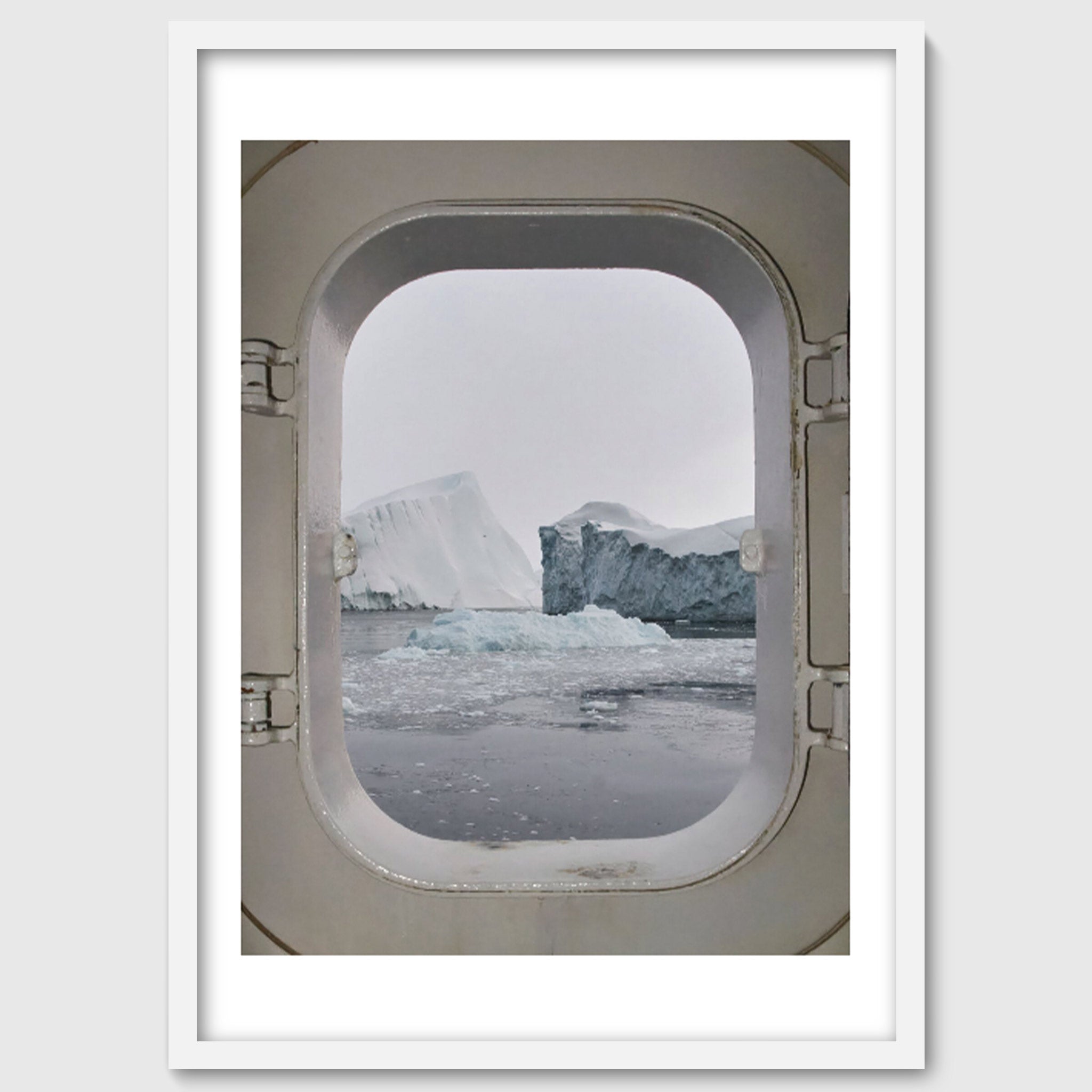 Portal – Icebergs Through a Ship Porthole, Greenland Arctic Photography