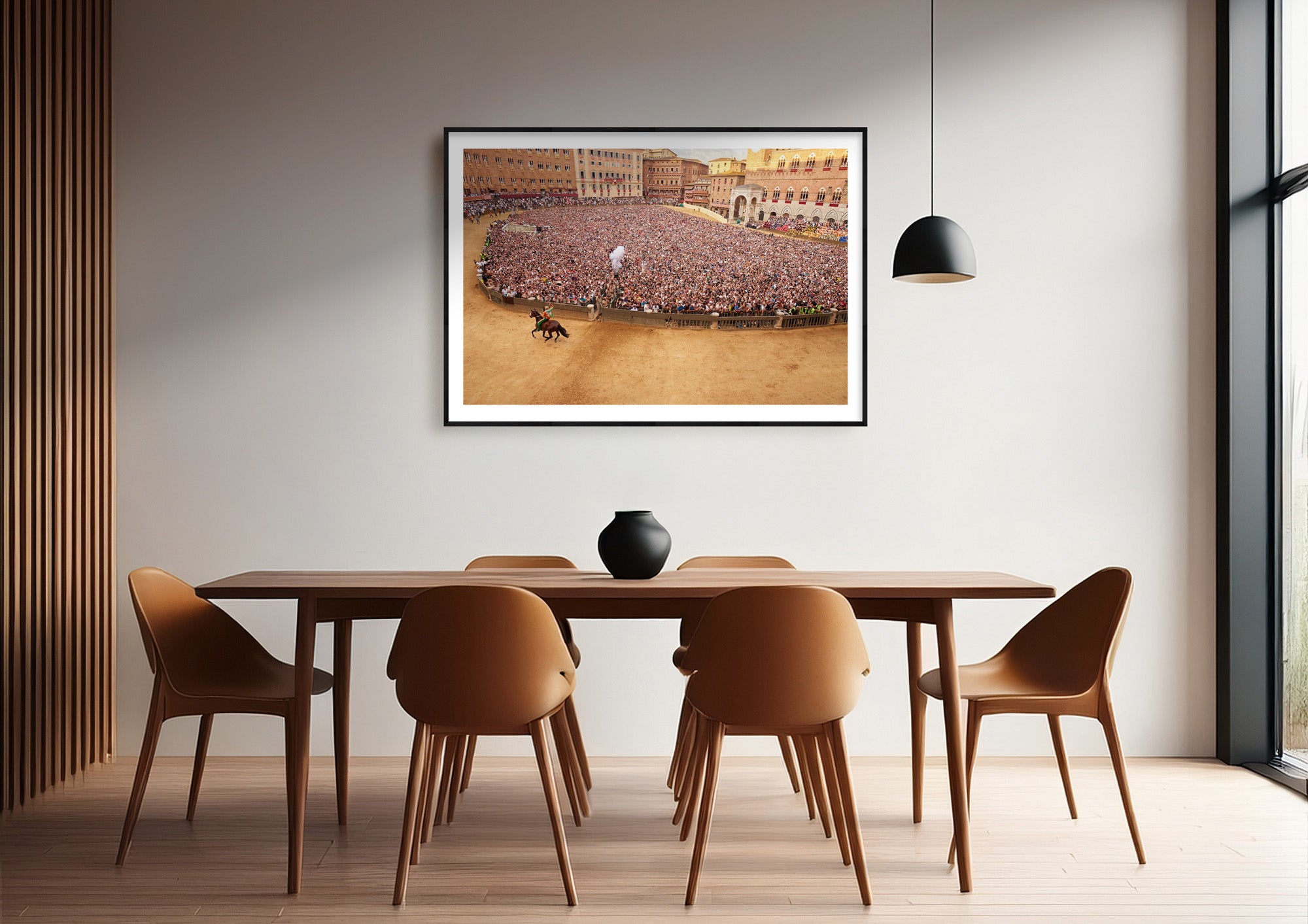 Colour photograph of the Palio di Siena horse race displayed as a large framed print in a styled interior setting (mockup)